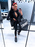 Black, stretchy jumpsuit with front zipper